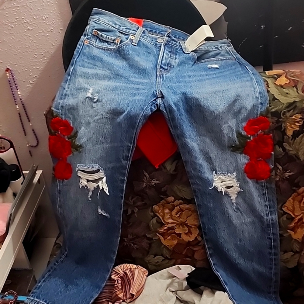 Levi's distressed with embroidered roses